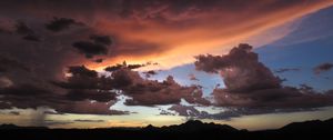 Preview wallpaper mountains, clouds, sunset, sky, cloudy