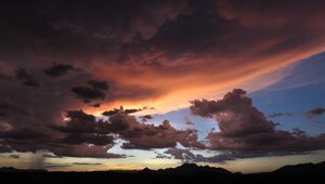 Preview wallpaper mountains, clouds, sunset, sky, cloudy