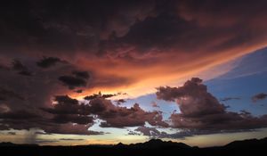Preview wallpaper mountains, clouds, sunset, sky, cloudy
