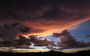 Preview wallpaper mountains, clouds, sunset, sky, cloudy