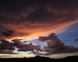 Preview wallpaper mountains, clouds, sunset, sky, cloudy