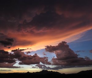 Preview wallpaper mountains, clouds, sunset, sky, cloudy