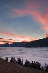 Preview wallpaper mountains, clouds, trees, dusk, sunset, landscape