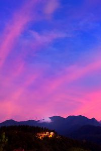 Preview wallpaper mountains, clouds, village, light, sky, aerial view