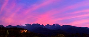 Preview wallpaper mountains, clouds, village, light, sky, aerial view