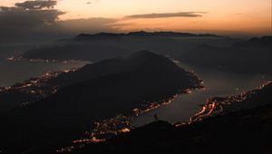 Preview wallpaper mountains, coast, aerial view, city, night, lights