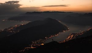 Preview wallpaper mountains, coast, aerial view, city, night, lights