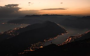 Preview wallpaper mountains, coast, aerial view, city, night, lights