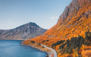 Preview wallpaper mountains, coast, road, autumn
