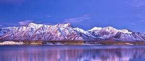 Preview wallpaper mountains, coast, snow-covered, reflection, sky, blue