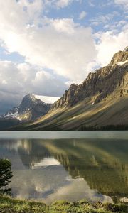 Preview wallpaper mountains, coast, tree, lake, canada, reflection, mirror