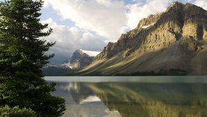 Preview wallpaper mountains, coast, tree, lake, canada, reflection, mirror