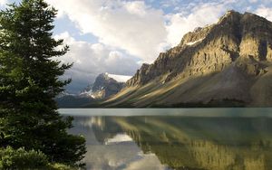 Preview wallpaper mountains, coast, tree, lake, canada, reflection, mirror