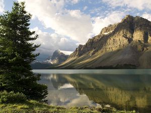 Preview wallpaper mountains, coast, tree, lake, canada, reflection, mirror