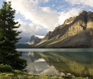 Preview wallpaper mountains, coast, tree, lake, canada, reflection, mirror
