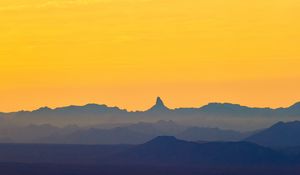 Preview wallpaper mountains, dusk, fog, sunset, orange