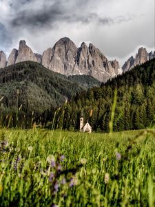 Preview wallpaper mountains, field, structure, grass, italy