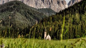 Preview wallpaper mountains, field, structure, grass, italy