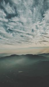 Preview wallpaper mountains, fog, aerial view, horizon, sky, clouds