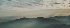 Preview wallpaper mountains, fog, aerial view, horizon, sky, clouds