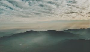 Preview wallpaper mountains, fog, aerial view, horizon, sky, clouds