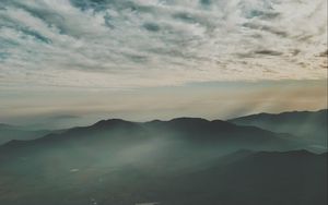 Preview wallpaper mountains, fog, aerial view, horizon, sky, clouds
