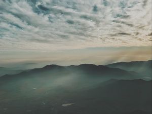 Preview wallpaper mountains, fog, aerial view, horizon, sky, clouds