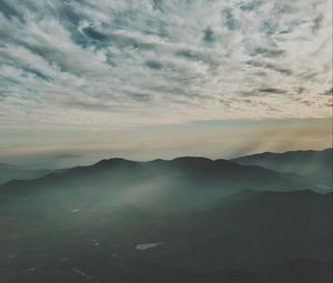 Preview wallpaper mountains, fog, aerial view, horizon, sky, clouds