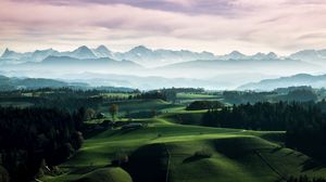 Preview wallpaper mountains, fog, buildings, hills, trees, landscape