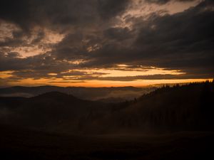 Preview wallpaper mountains, fog, dusk, sunset, clouds, aerial view