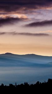 Preview wallpaper mountains, fog, evening, outlines, clouds