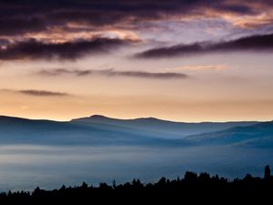 Preview wallpaper mountains, fog, evening, outlines, clouds