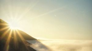 Preview wallpaper mountains, fog, grass, sun, nature