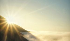 Preview wallpaper mountains, fog, grass, sun, nature