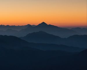 Preview wallpaper mountains, fog, horizon, outlines, silhouettes, italy