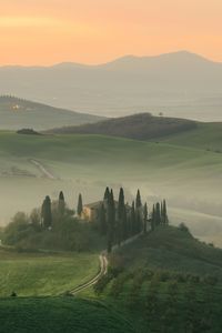 Preview wallpaper mountains, fog, house, trees, landscape