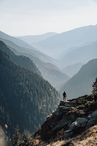 Preview wallpaper mountains, fog, man, rock, nature