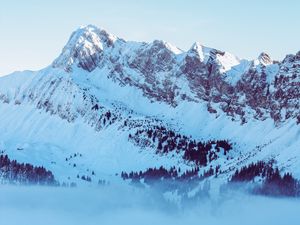 Preview wallpaper mountains, fog, peak, snow, snowy, twilight