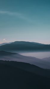 Preview wallpaper mountains, fog, peaks, sky, twilight, iran