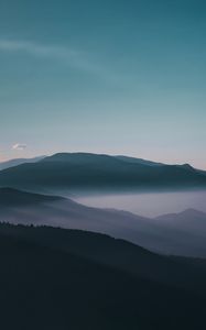 Preview wallpaper mountains, fog, peaks, sky, twilight, iran