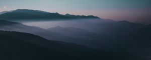 Preview wallpaper mountains, fog, peaks, sky, twilight, iran