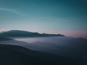 Preview wallpaper mountains, fog, peaks, sky, twilight, iran