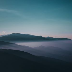 Preview wallpaper mountains, fog, peaks, sky, twilight, iran