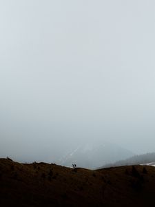 Preview wallpaper mountains, fog, silhouettes, couple, hike, nature