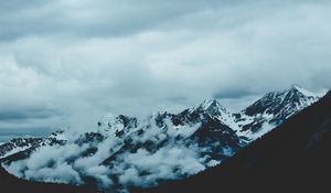 Preview wallpaper mountains, fog, sky, peaks, snow-covered