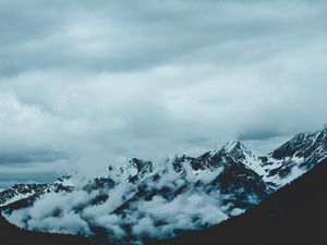 Preview wallpaper mountains, fog, sky, peaks, snow-covered