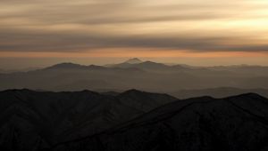 Preview wallpaper mountains, fog, sky, sunset, distance