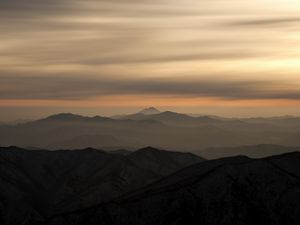 Preview wallpaper mountains, fog, sky, sunset, distance