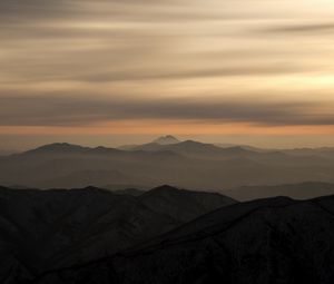 Preview wallpaper mountains, fog, sky, sunset, distance