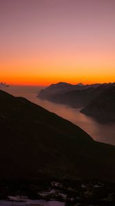 Preview wallpaper mountains, fog, sunset, lake, italy